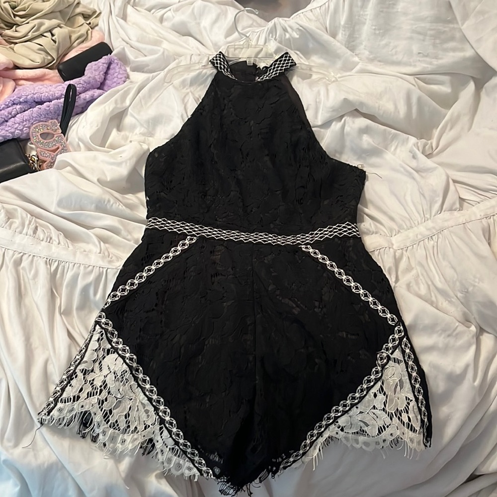 black romper with white detailing